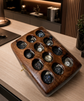 Handcrafted walnut watch case with glass display and gold-tone hardware