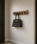 Wall mounted walnut coat organizer with practical space saving hooks