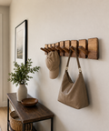 Handcrafted walnut piano style coat rack with durable wooden hooks