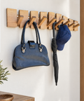 Decorative walnut wall rack with discreet folding wooden hooks