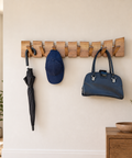 Live edge walnut wall hook rack designed for coats and everyday accessories