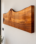 Natural edge walnut coat rack with space saving folding hook design